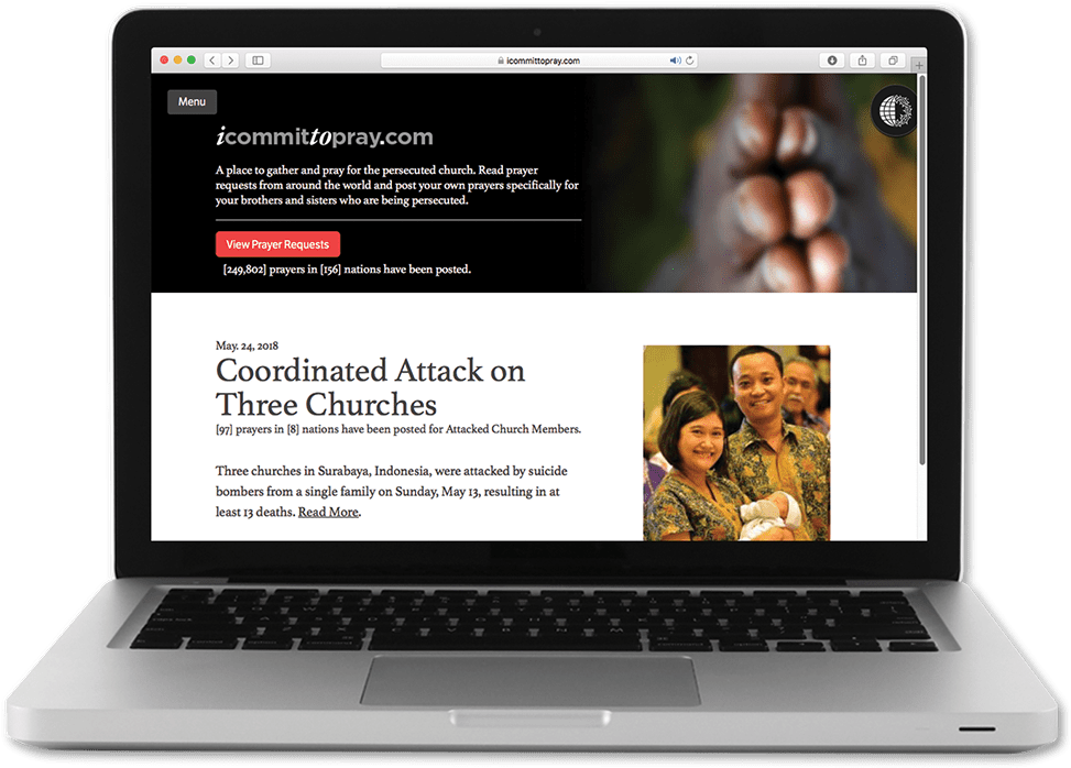 Laptop with browser showing icommittopray.com